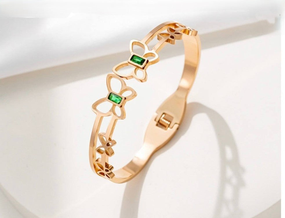 Gold Butterfly Bracelet with Green Gemstones – Elegant Women’s Jewelry